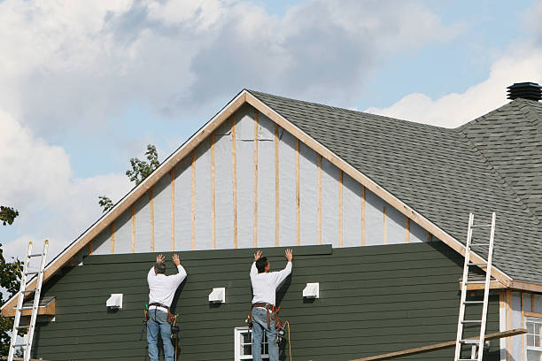Professional Emergency Siding Repair technician working in Enfield, NC